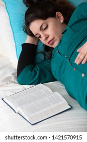 Young Expectant Mom Reading Her Bible In The Morning