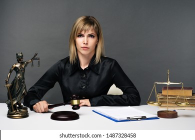 A Young Fair Woman Judge Works In Her Office. - Image