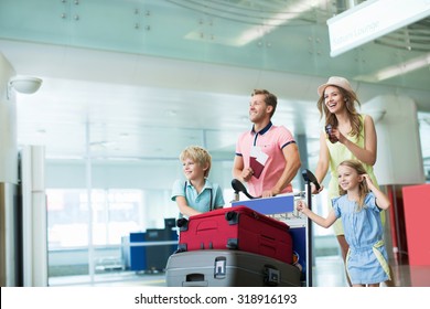 Young Family At The Airport