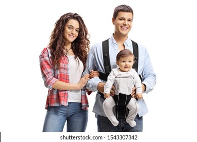 Young Family With A Baby In A Carrier Isolated On White Background