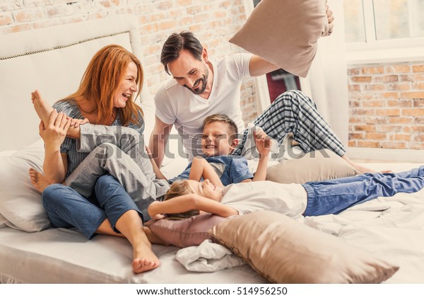 Young family being playful\
at home
