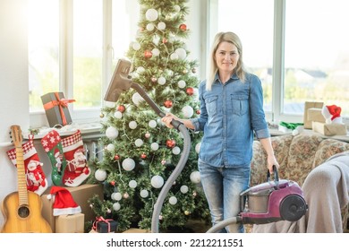 Young Family Cleaning Apartment After Christmas Party.