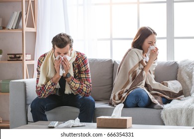 Young family couple together at home casual - Powered by Shutterstock