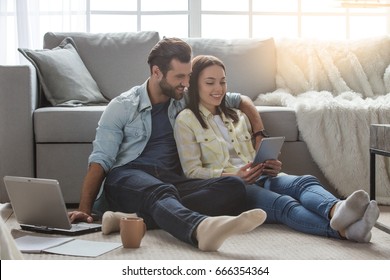 Young Family Couple Together At Home Casual