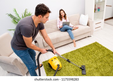 Young family doing cleaning at home - Powered by Shutterstock