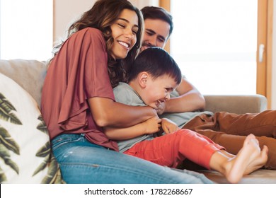 Young Family Having Fun At Home