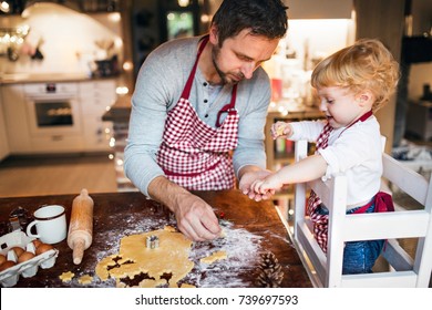 Young family making cookies at home. - Powered by Shutterstock