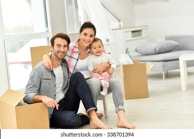 Young Family Moving Into New Home