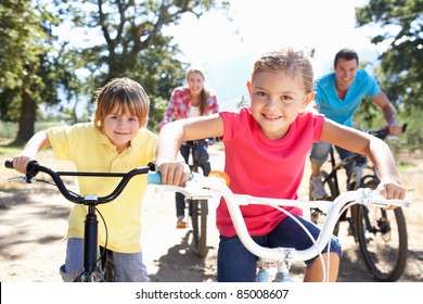 Young Family On Country Bike Ride