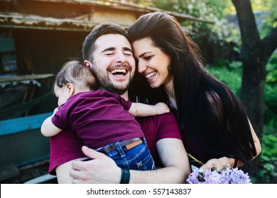 young family on the nature in the countryside