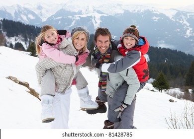 Young Family On Winter Vacation