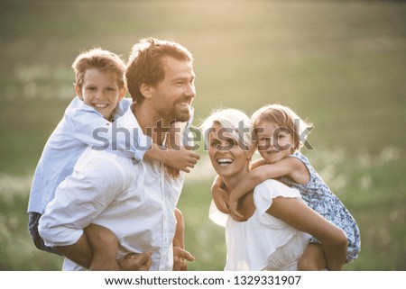 Similar – Image, Stock Photo Sisters enjoying piggyback ride