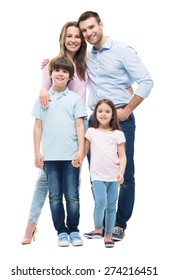 Young Family With Two Children Standing Together
