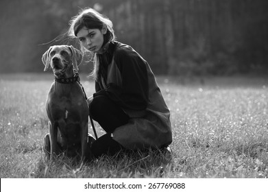 Young Fashion Girl Model Walk With Her Dog Outdoor Park Nature Background