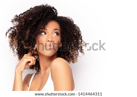 Similar – Image, Stock Photo Black woman traveler standing on rocky cliff