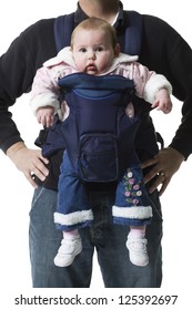 Young Father With Baby In Baby Carrier