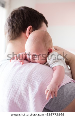 [Obrazek: young-father-burping-his-newborn-450w-636772546.jpg]