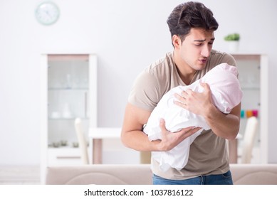 Young Father Dad Frustrated At Crying Baby