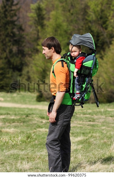 1 year old in baby carrier