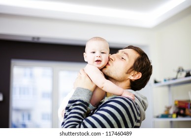 Young father and his baby - Powered by Shutterstock