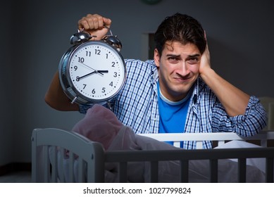 Young Father Under Stress Due To Baby Crying At Night