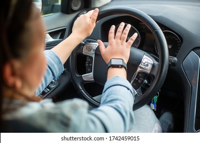 Young Female Aggressive Driver Using Horn Or Trumpets To The Another Cars, Dangerous Driver