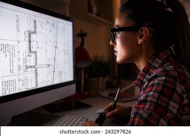 Young Female Architect Working At Home.She Works  Late Into The Night.