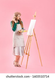 Young Female Artist On Color Background