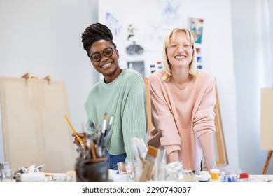 Young female artists are posing in their painting studio - Powered by Shutterstock