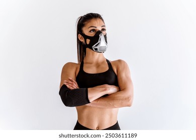 Young female athlete training in a gym using sport equipment. Fit woman working out . Concept about fitness, wellness and sport preparation. - Powered by Shutterstock