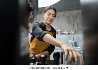 Young Female Barista Preparing Coffee in a Modern Cafe with Industrial Interior Design - Powered by Shutterstock