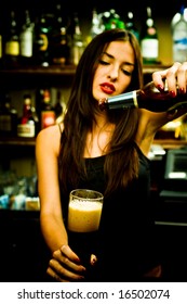 A Young Female Bartender, Photographed At Work.