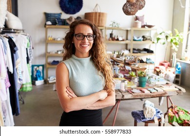Young Female Business Owner In A Clothes Shop, Portrait