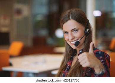 Young Female In Call Center Team