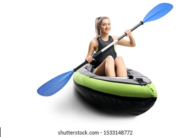 Young female in a canoe with paddles smiling isolated on white background - Powered by Shutterstock