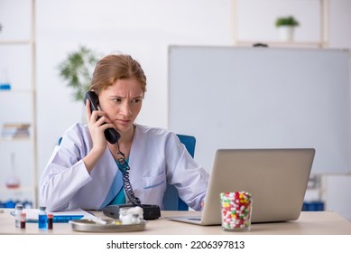 Young Female Chemist In Drugs Synthesis Concept