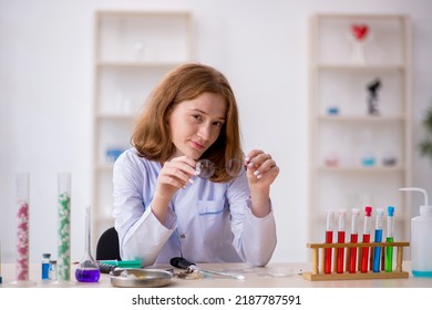 Young Female Chemist Working At The Lab