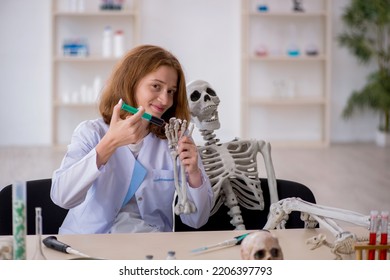 Young Female Chemist Working At The Lab