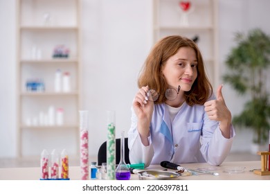 Young Female Chemist Working At The Lab