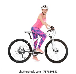 Young female cyclist riding bicycle on white background - Powered by Shutterstock