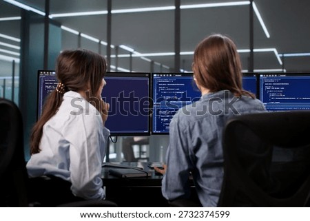 Young Female Developer Codes Software For Data Analysis And Web Development.