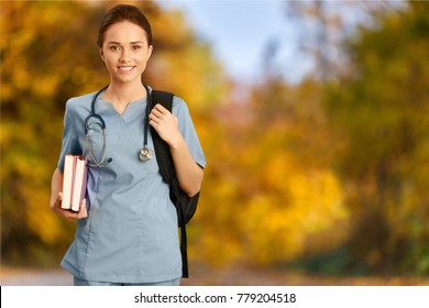 Young female doctor with blurred background
