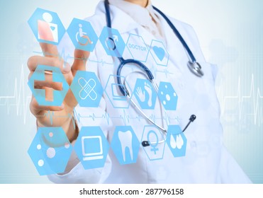 Young Female Doctor Touching Icon Of Media Screen