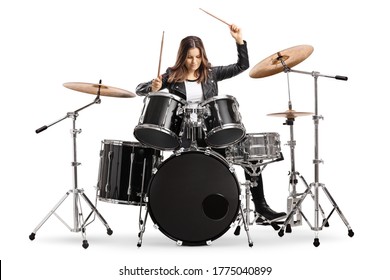 Young female drummer playing drums with drumsticks isolated on white background
