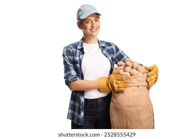 Young female farmer holding potatoes in a sack isolated on white background - Powered by Shutterstock