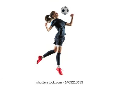 Young female football or soccer player with long hair in sportwear and boots kicking ball for the goal in jump isolated on white background. Concept of healthy lifestyle, professional sport, hobby. - Powered by Shutterstock