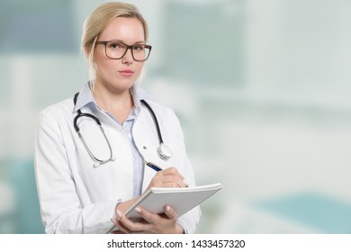 young female friendly doctor with stethoscope and clipboard