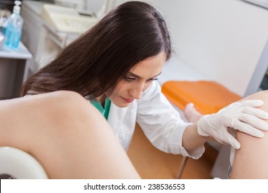 Young Female Gynecologist During Examination In Her Office