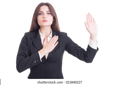 Young Female Lawyer Making Oath Gesture With Hand On Heart Isolated On White Background