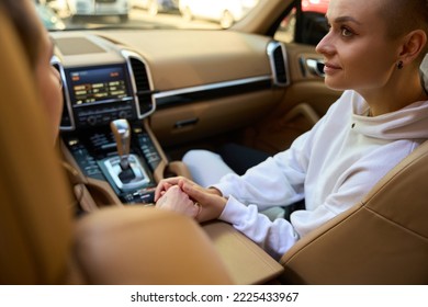 Young female LGBT couple sitting in a car - Shutterstock ID 2225433967